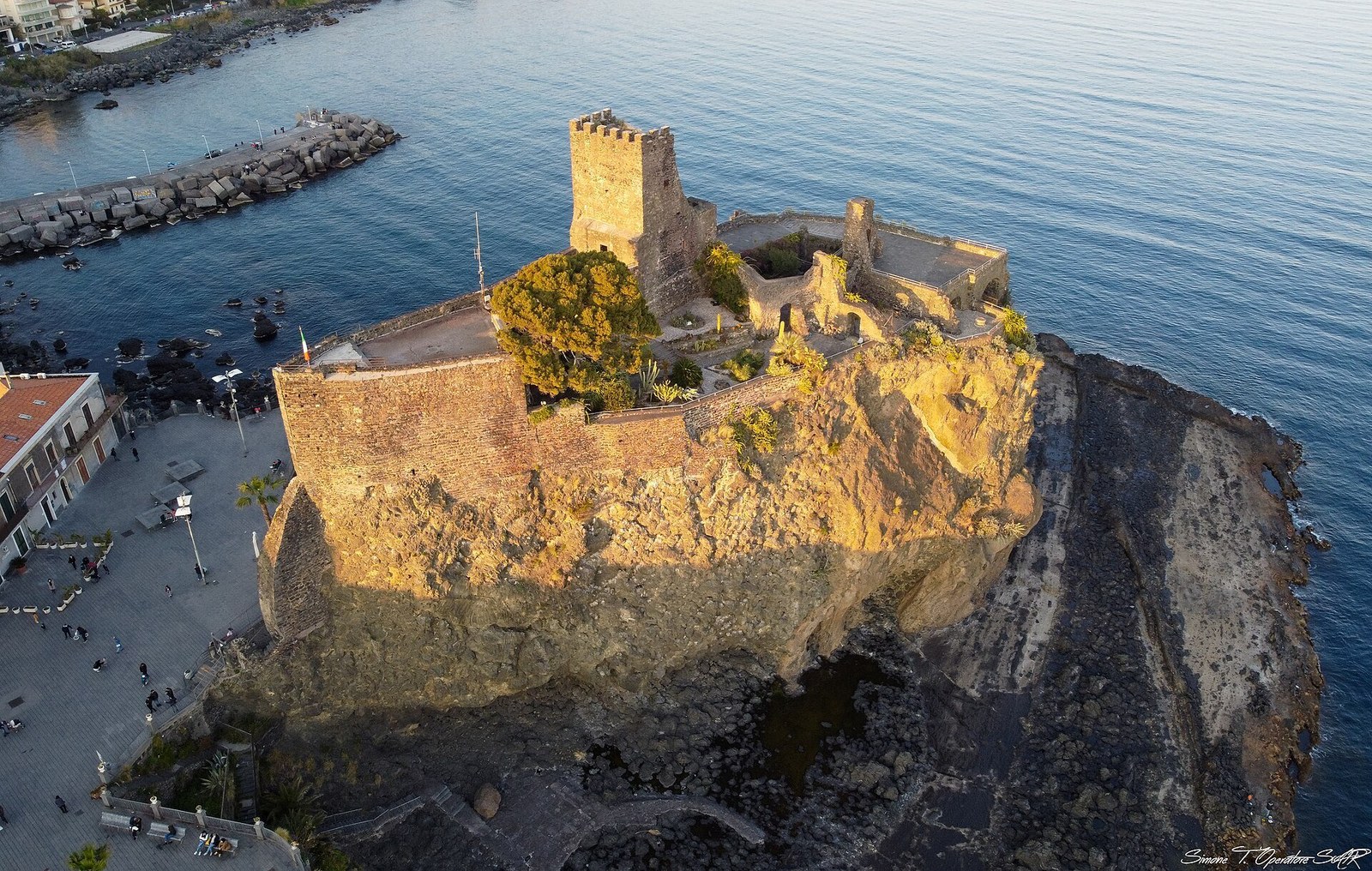 Norman castle on volcanic rock in Aci Castello near Catania Sicily