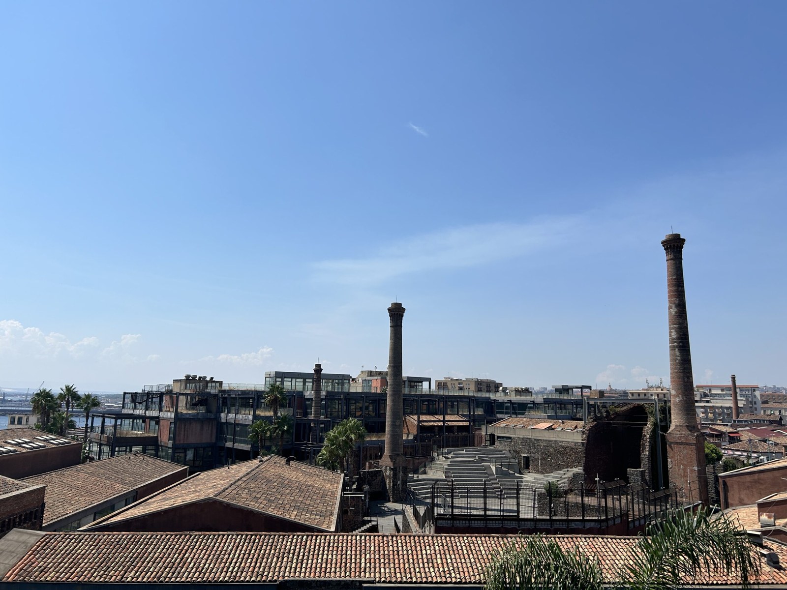 Le Ciminiere industrial chimneys — the cultural-event district near the city-centre club scene