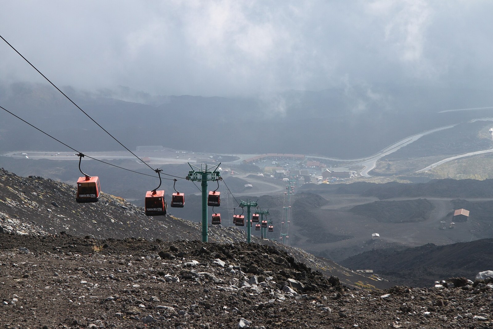 View looking down upon Rifugio Sapienza and Nicolosi from a Mount Etna hiking trail