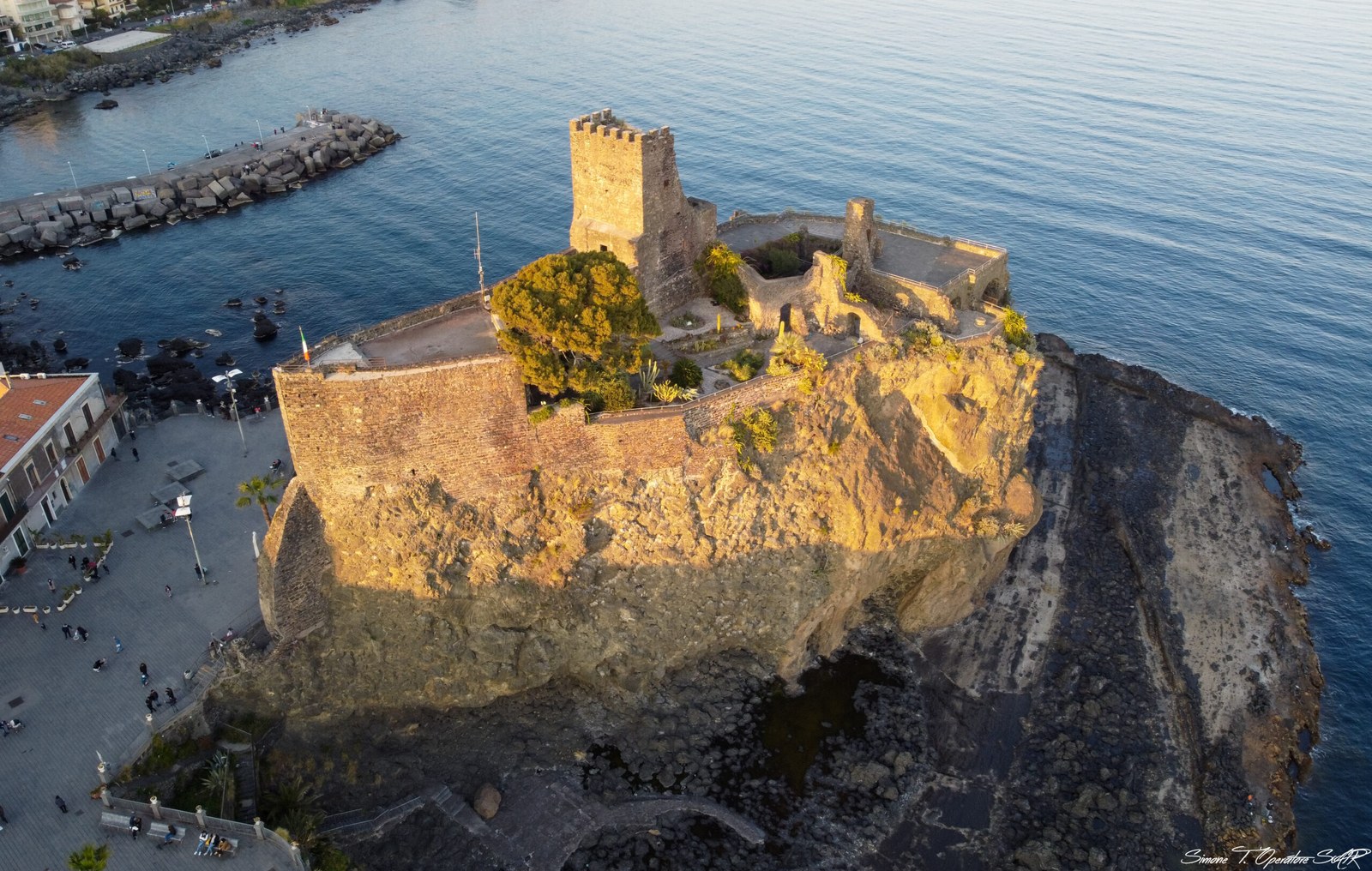 Castello Normanno-Svevo of Aci Castello on a lava rock spur above the Ionian Sea — Sicily honeymoon coast