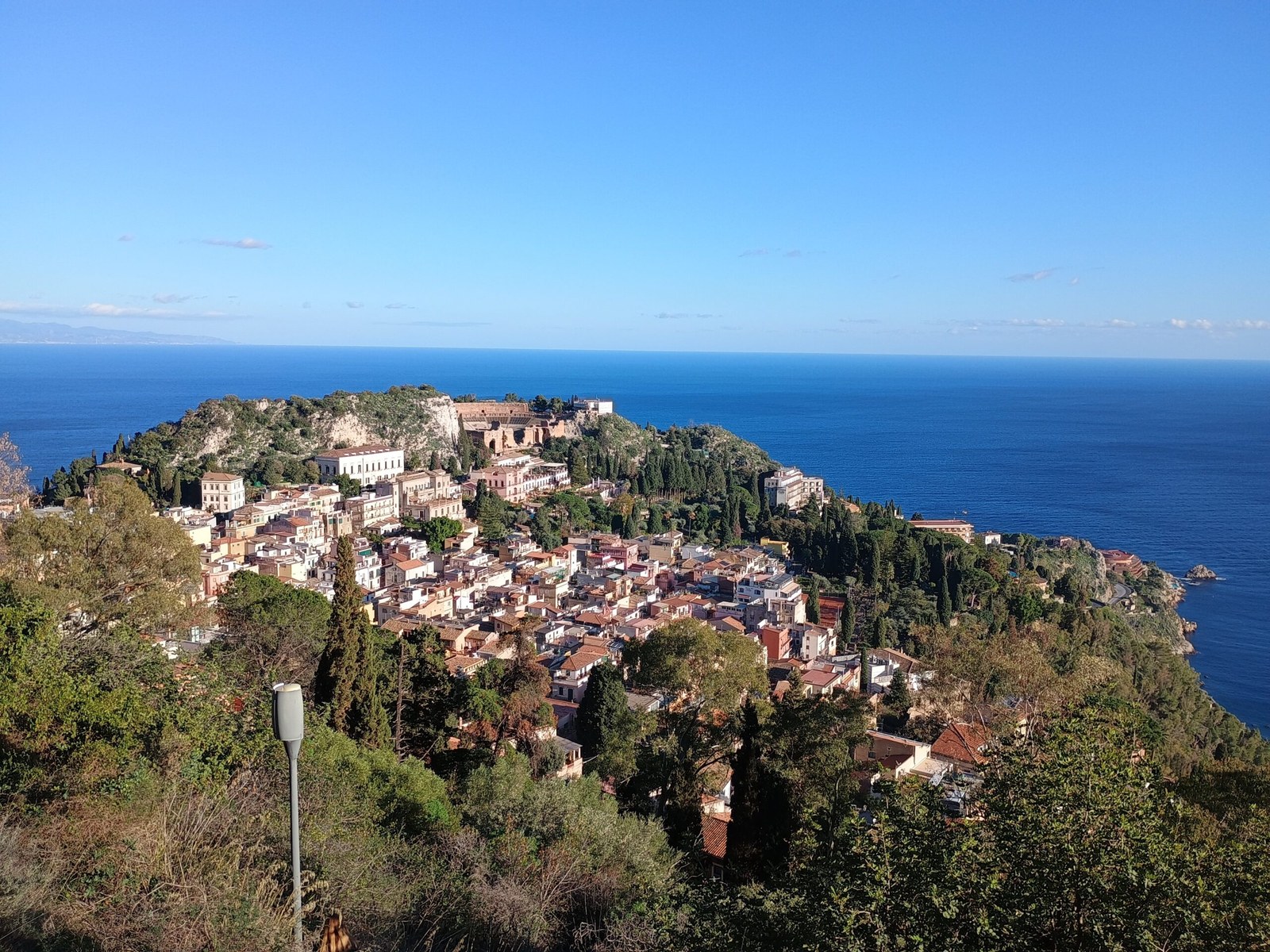 Panoramic view of Taormina with Mount Etna in the background — a romantic overlook perfect for a Sicily honeymoon