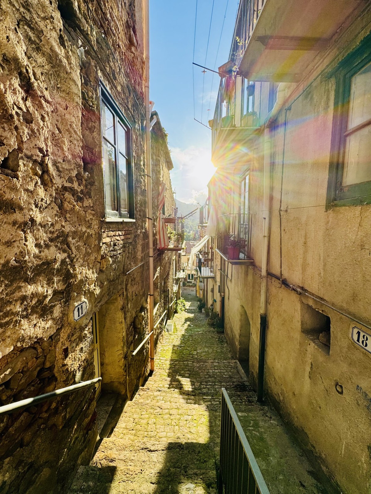 Castelbuono Madonie street view at golden hour — borgo Madonie Park sede del festival dei funghi di ottobre