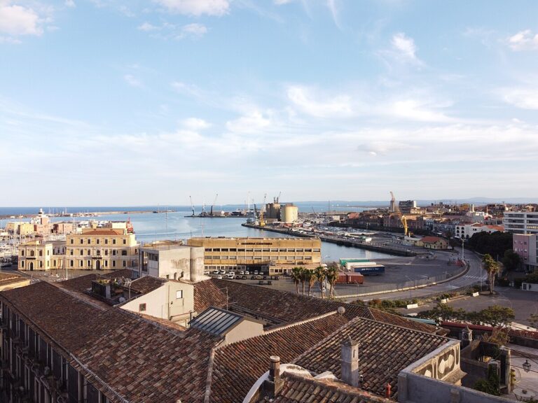 Aerial view of Catania port and coast with Mount Etna in the background eastern Sicily