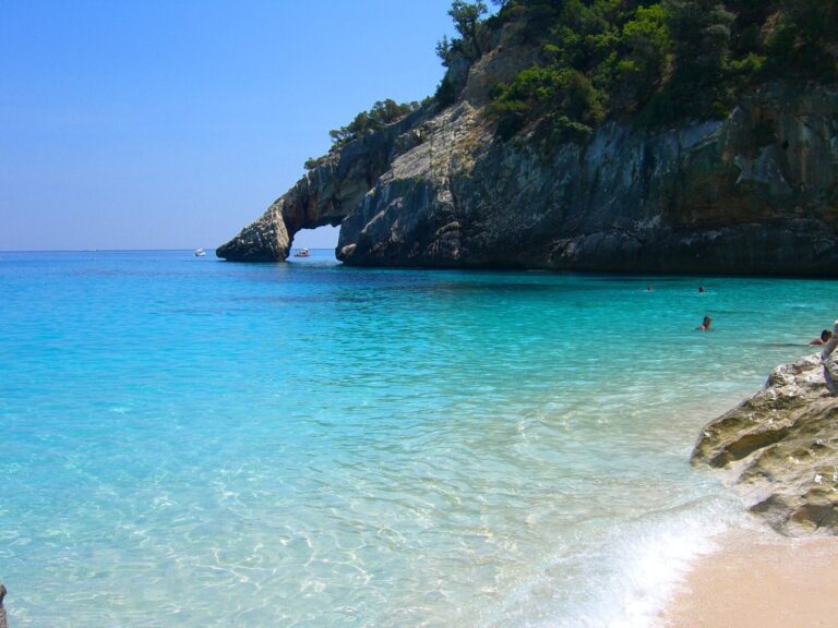 Cala Goloritzé natural rock arch and turquoise sea — the iconic Sardinia beach in the Gulf of Orosei, often cited as the most photographed cove on the island