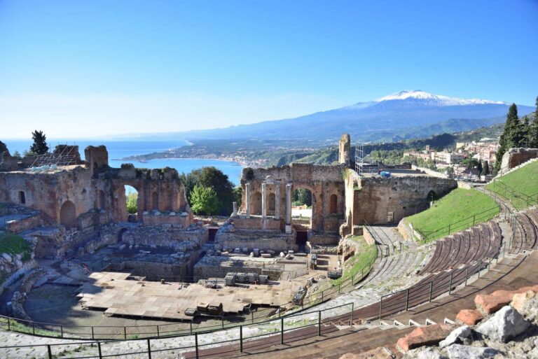 Ancient Greek Theatre in Taormina with Mount Etna in the background