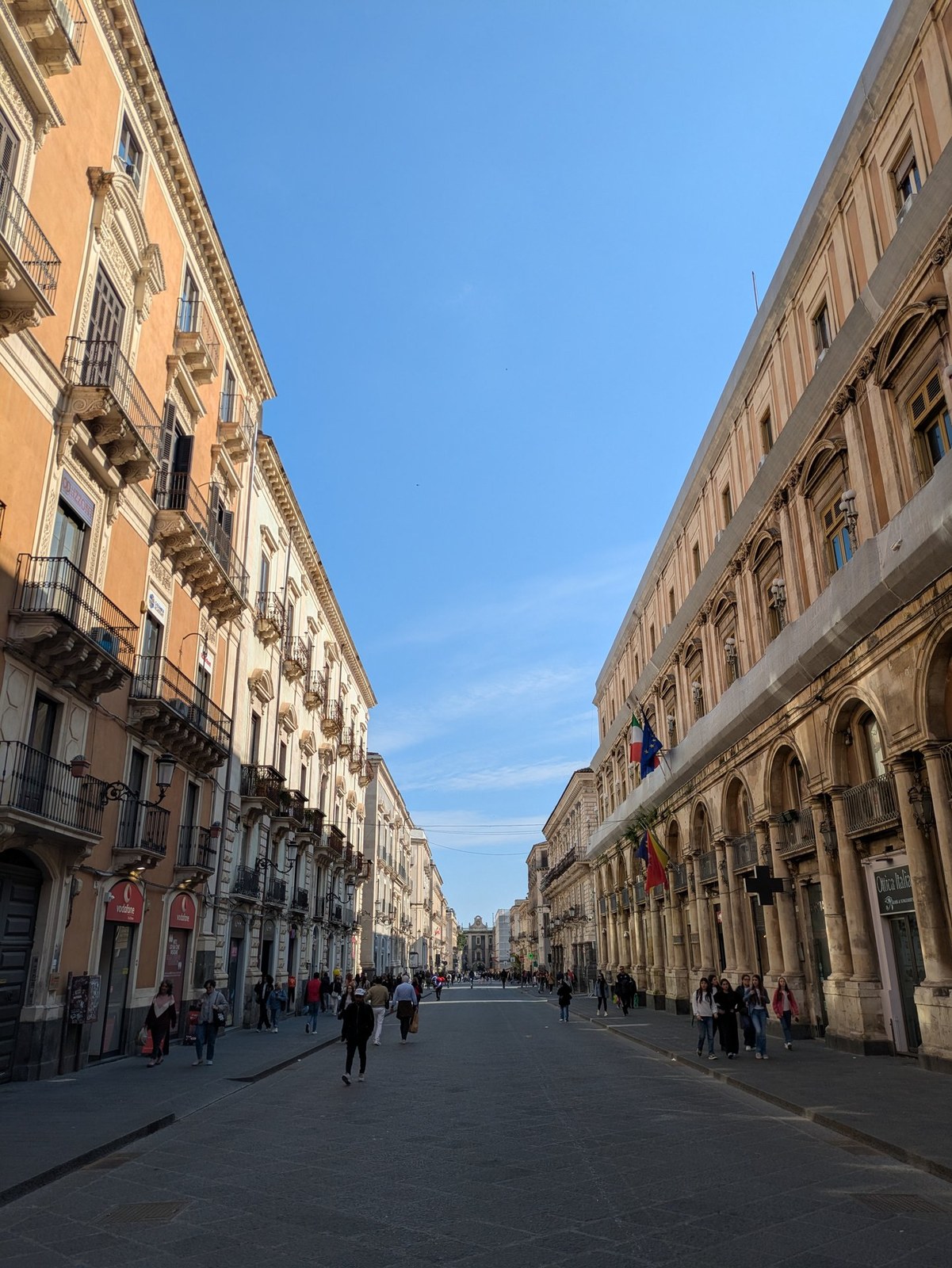 Via Etnea in Catania pedestrian zone with Etna in the background