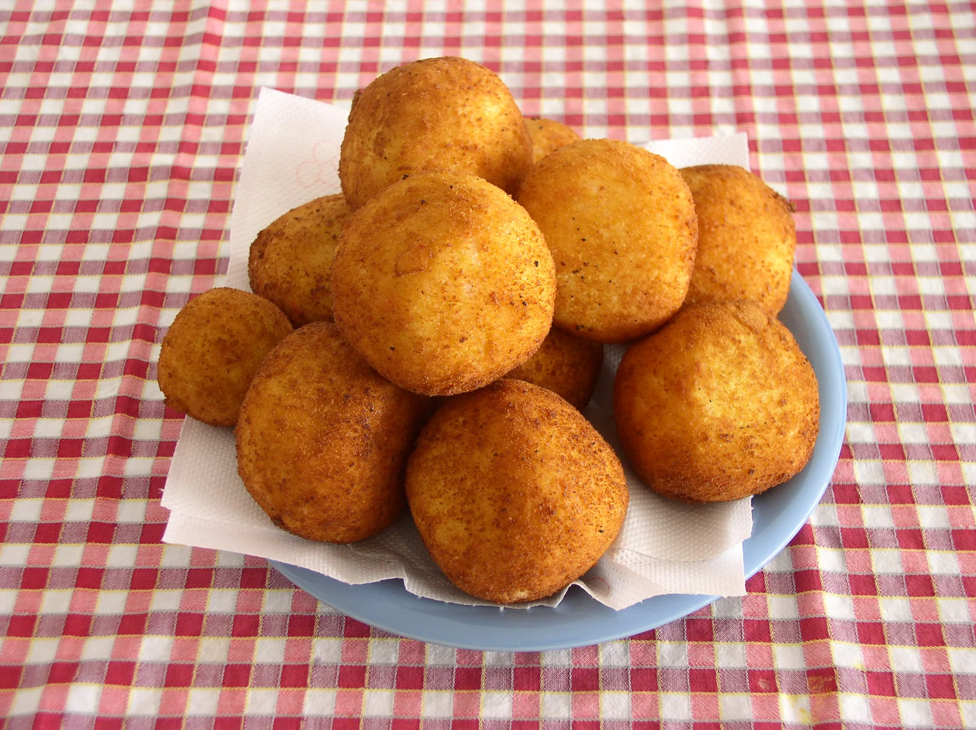 Arancini di Catania al ragu, ricetta tradizionale catanese