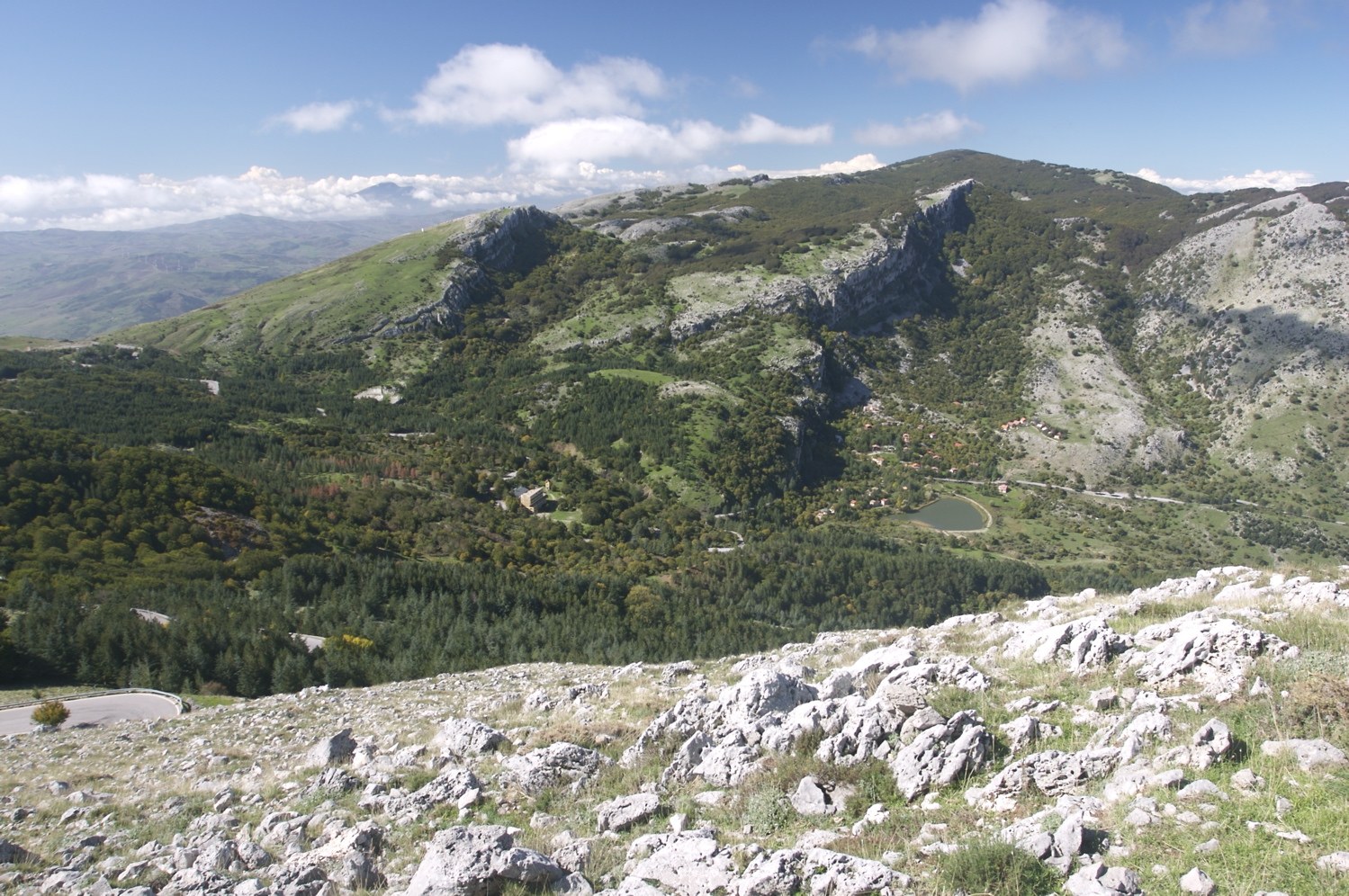 Pizzo Carbonara summit Madonie Mountains 1.979 m — inland heat-escape with 6-8°C cooler air than the Sicilian coast in August