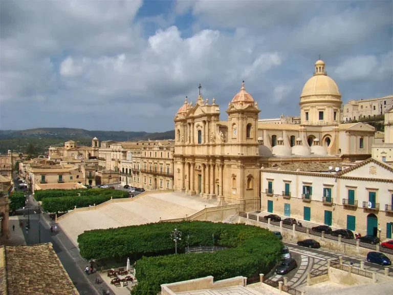 Facade of Noto Cathedral in Sicily seen from the main staircase in the historic Baroque centre