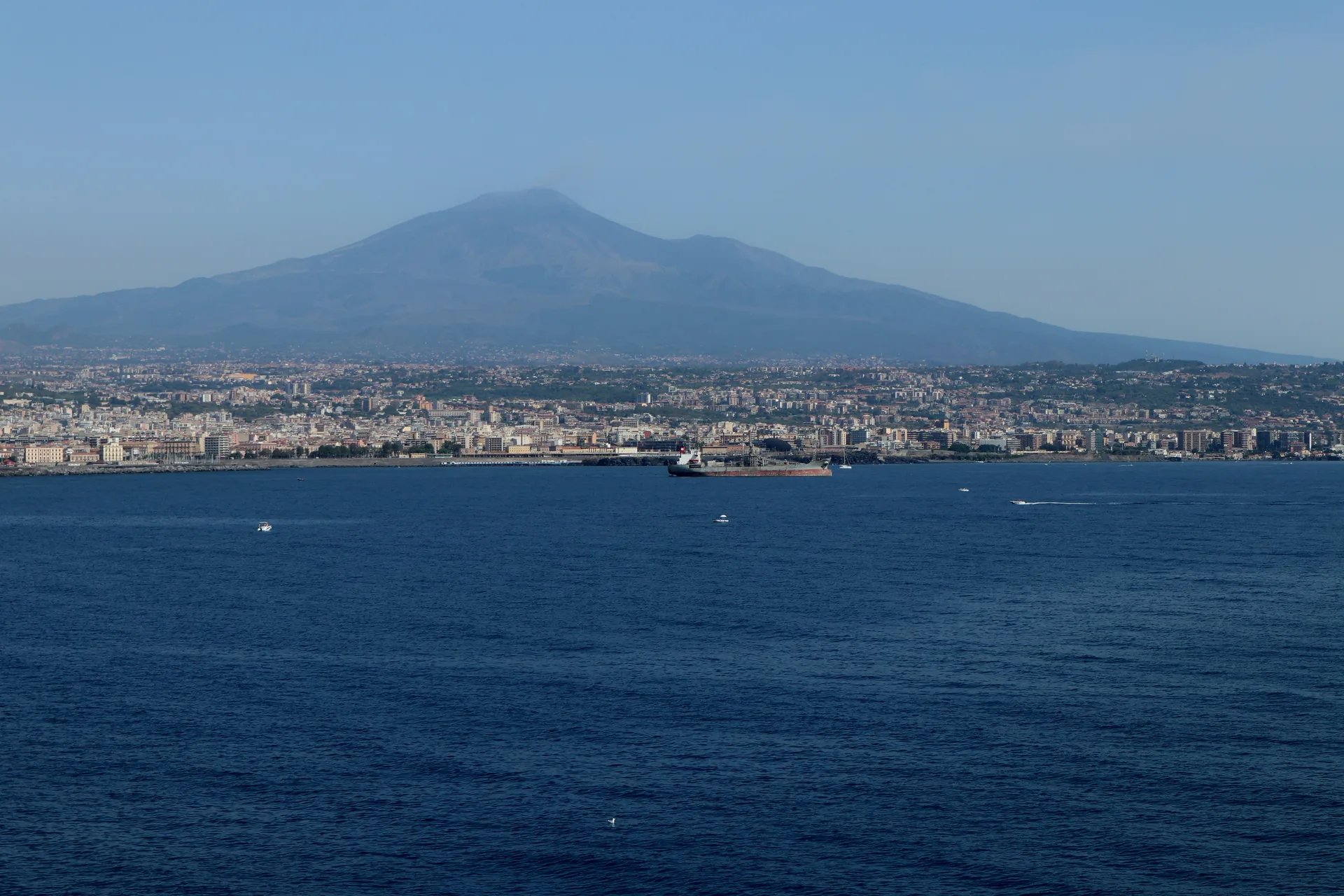 Catania seen from the sea with Mount Etna backdrop
