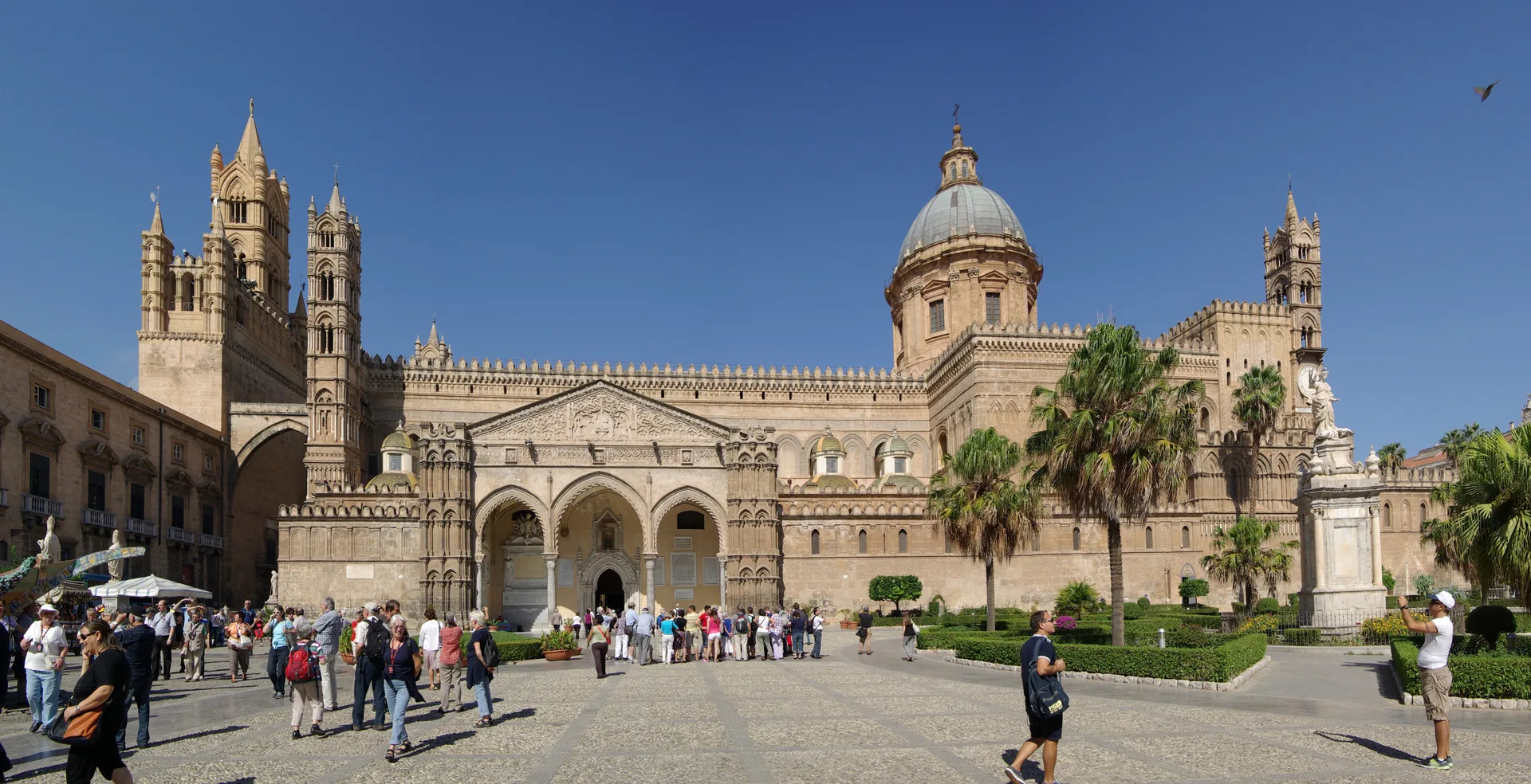 Palermo Cathedral exterior on a sunny day, symbol of Sicily's cultural wealth and safety